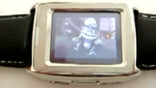 M500 GSM/MP3/MP4 Cellphone Watch, In Action